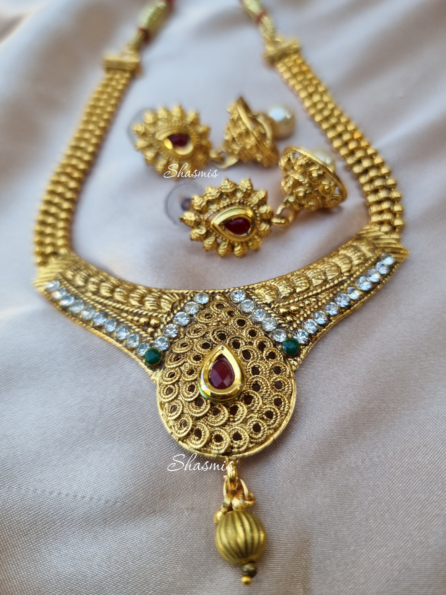 Gold Plated Temple Jewellery Necklace And Earrings With Rhinestone and Ruby Centre Stone