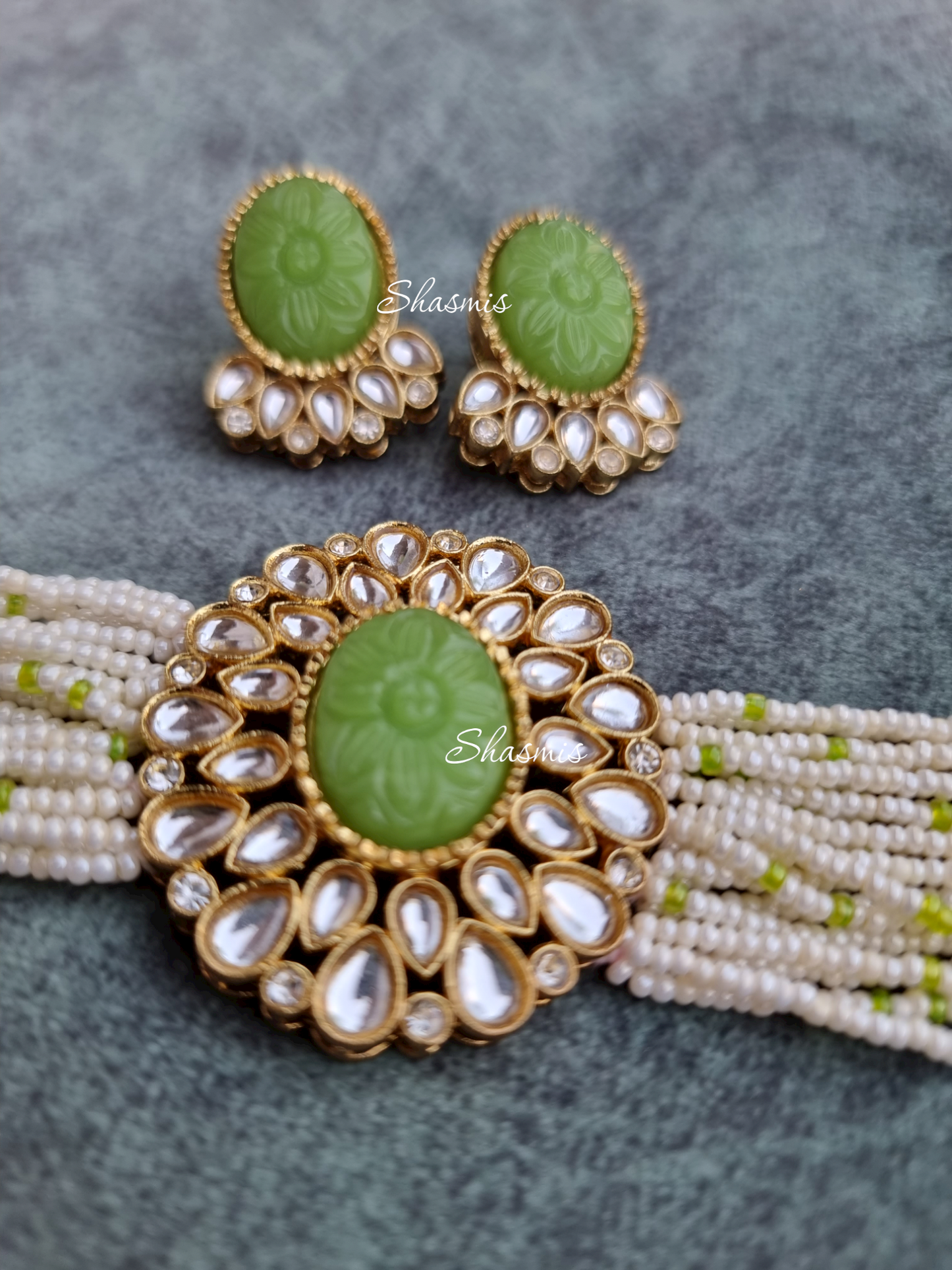 Carved Stones on Centre Necklace With Beads and Earrings