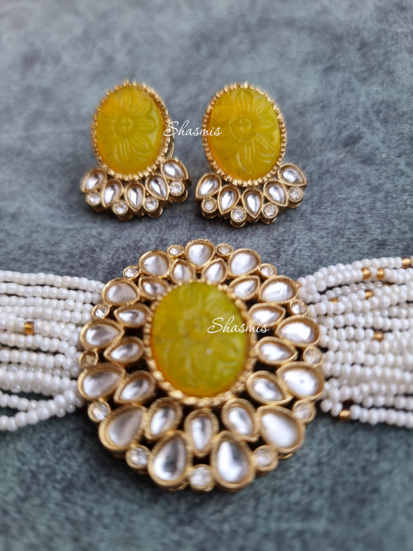 Carved Stones on Centre Necklace With Beads and Earrings