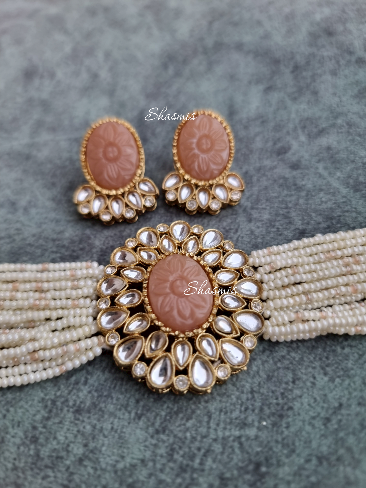 Carved Stones on Centre Necklace With Beads and Earrings