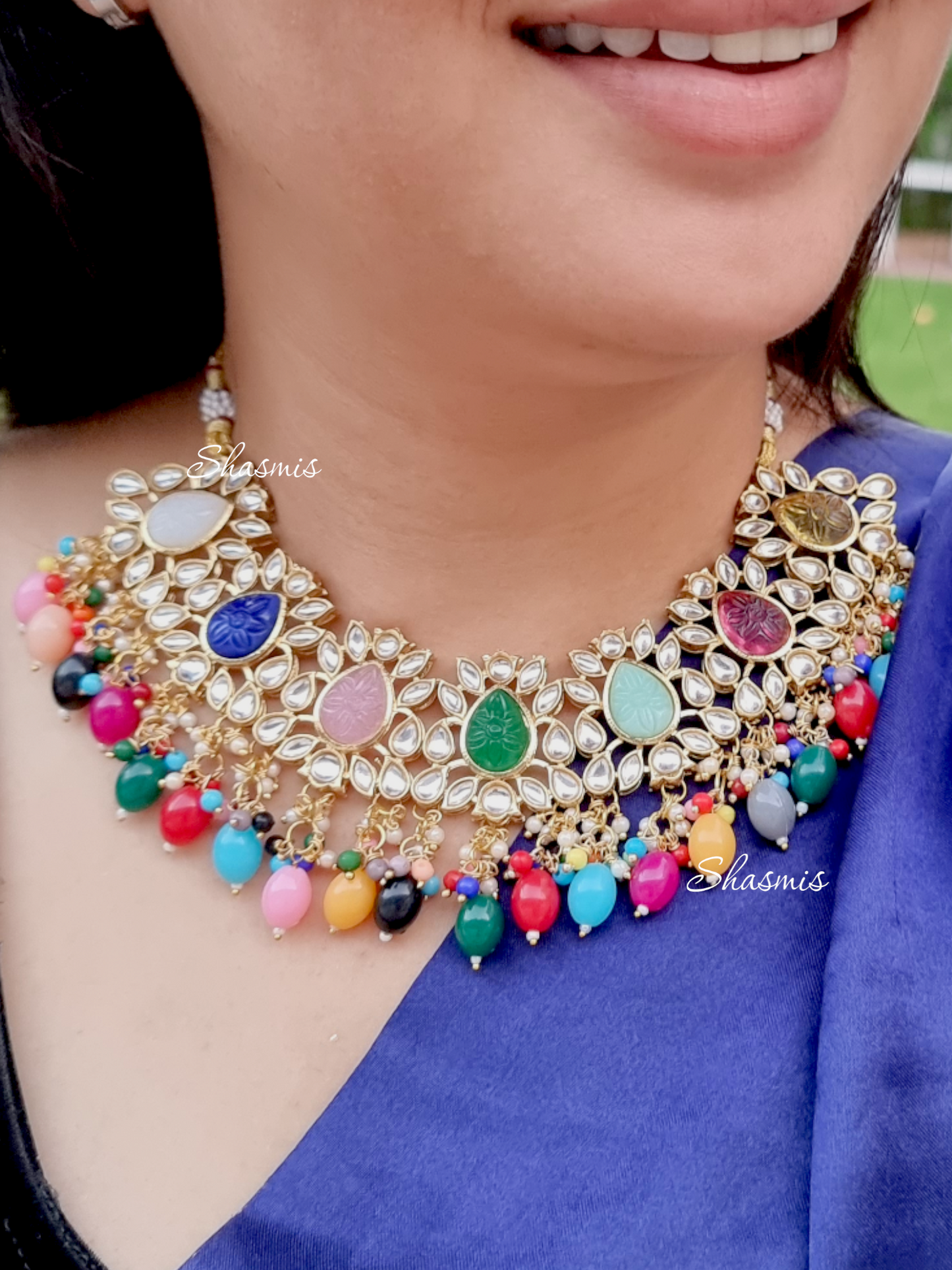 Kundan Stones Necklace And Earrings With Pearl On Drop And Almond shape Carved Stones