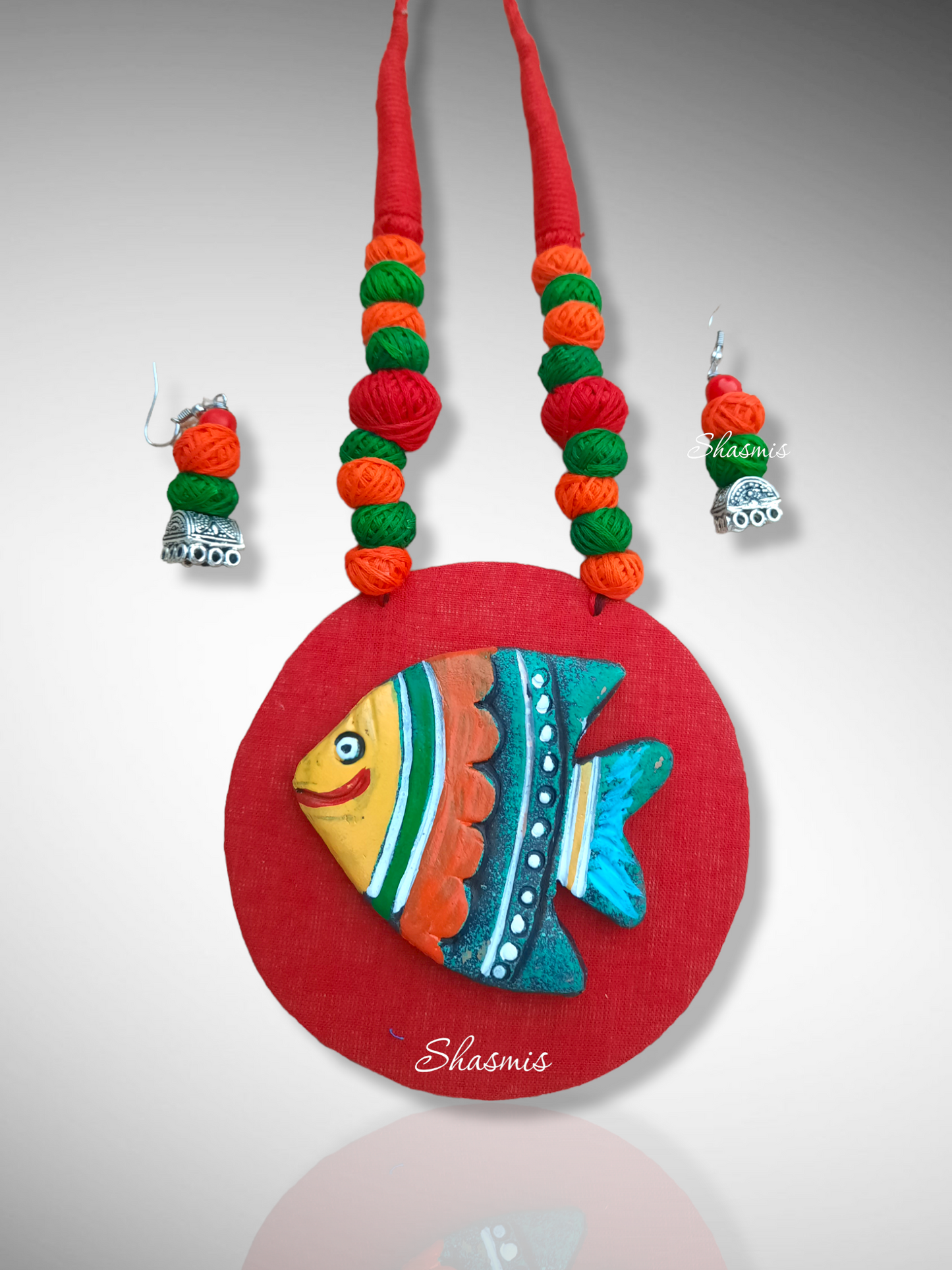 Fabric Jewellery With Fish Design Clay Work
