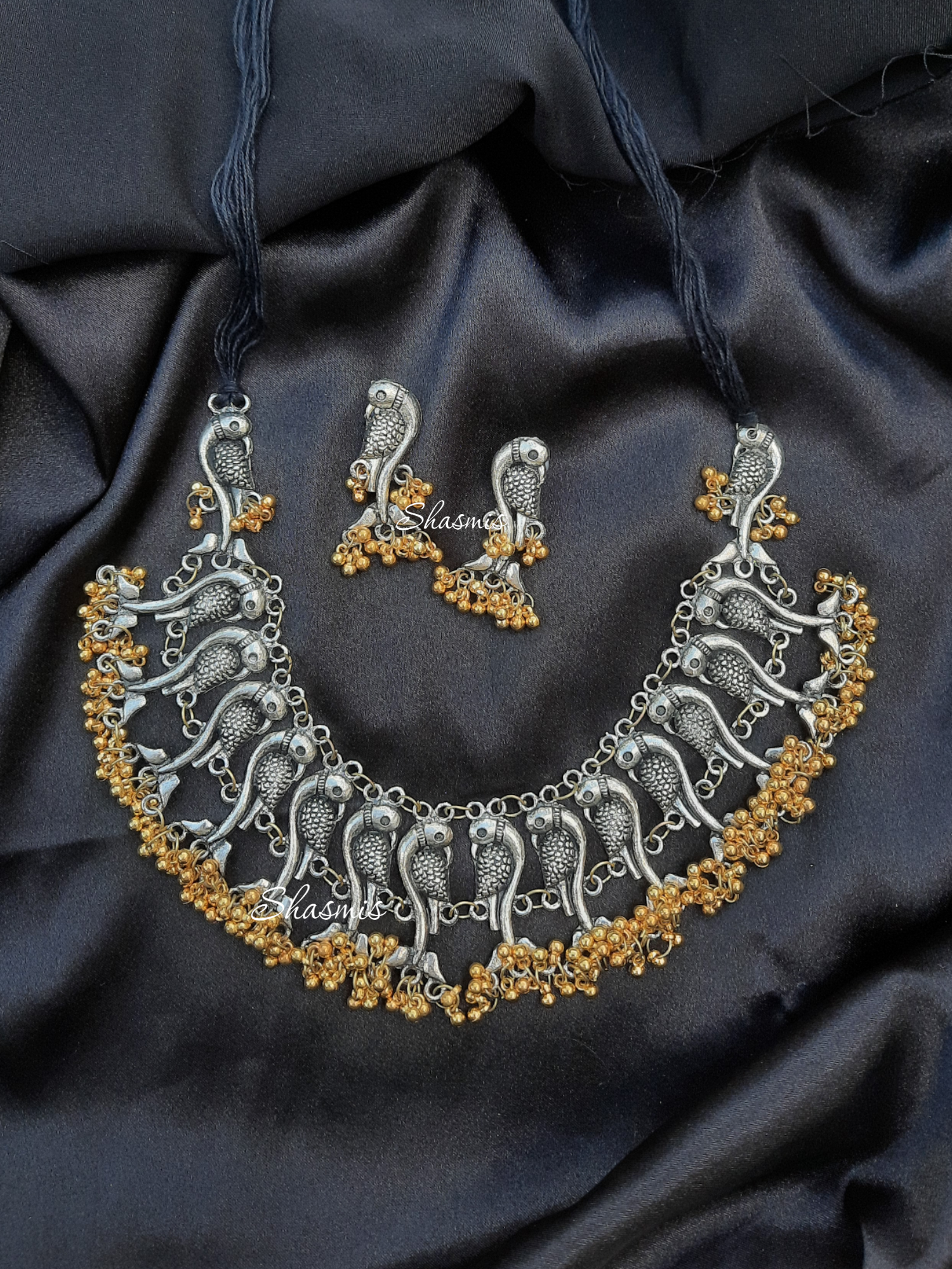Silver Peacock Oxidised Necklace With Golden Ghungroo and Earrings