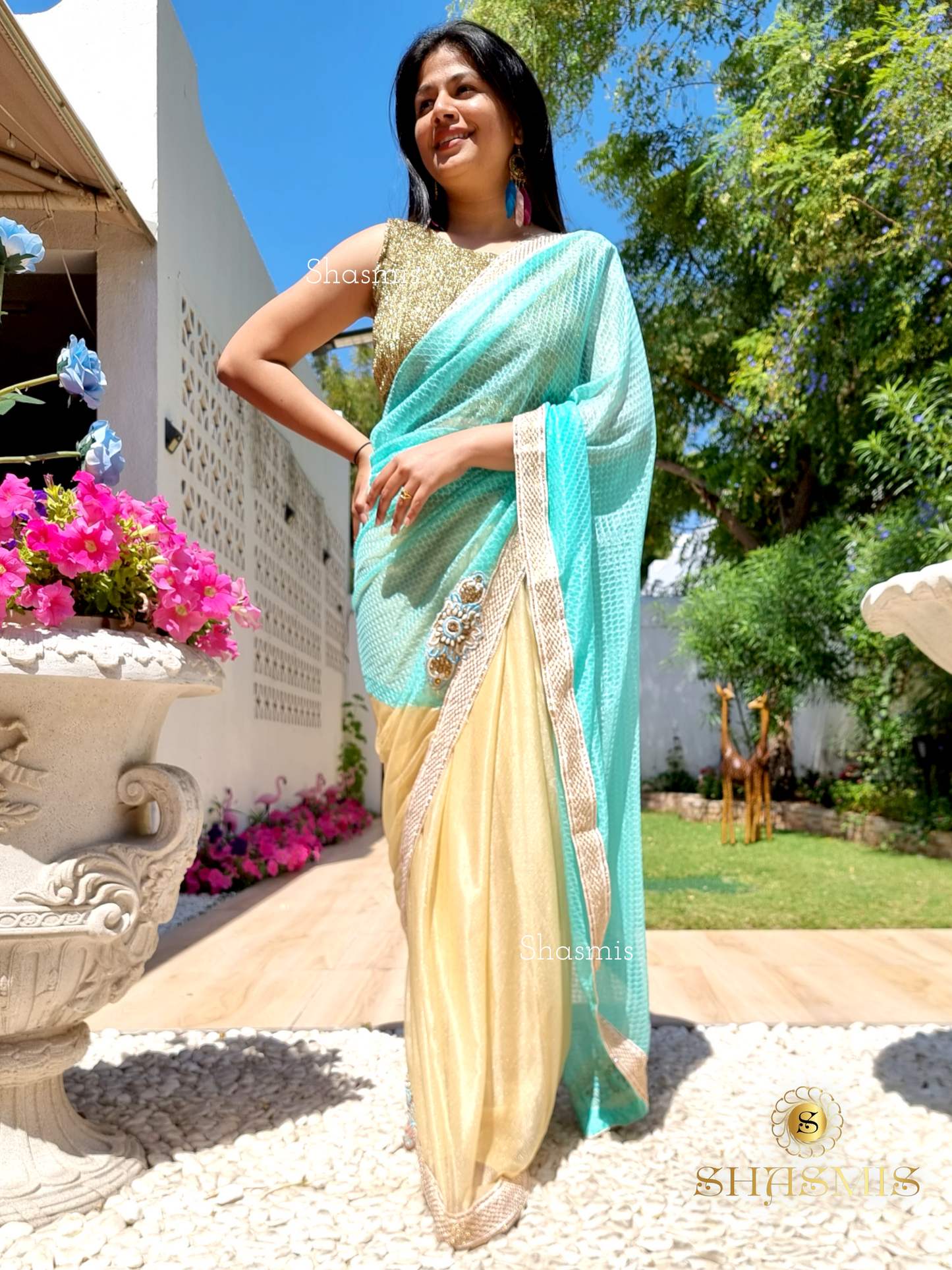 Golden Shade With Mint Blue Net Design Georgette Saree