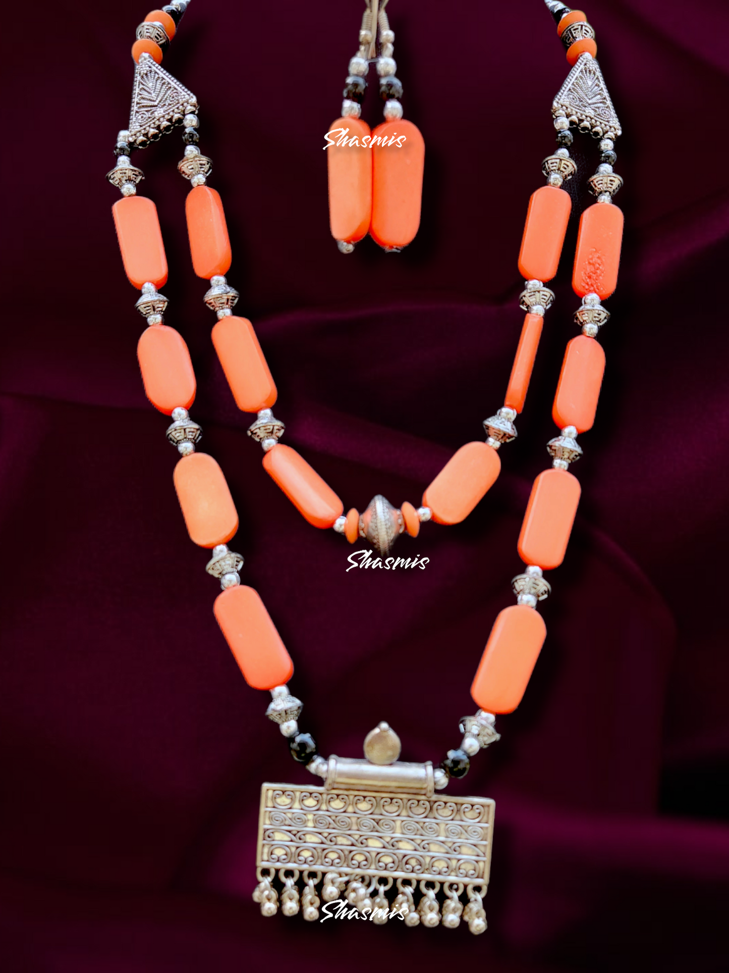Long Orange Color Beads With Silver Rectangle Pendent With Ghungroo On Drop