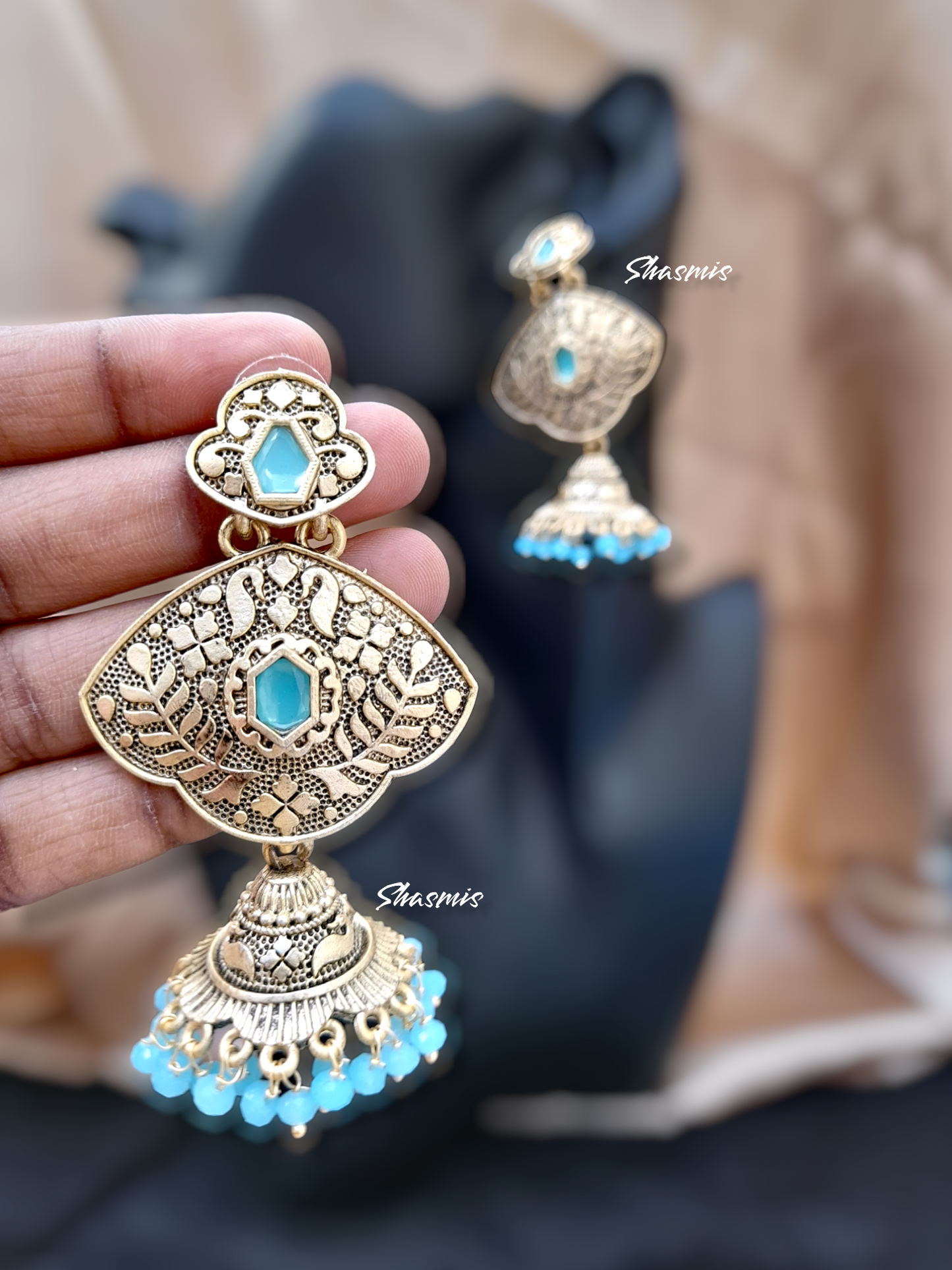 Blue Color Centtre Stone With Gold Matt Finish and Pearls On Drop Earrings