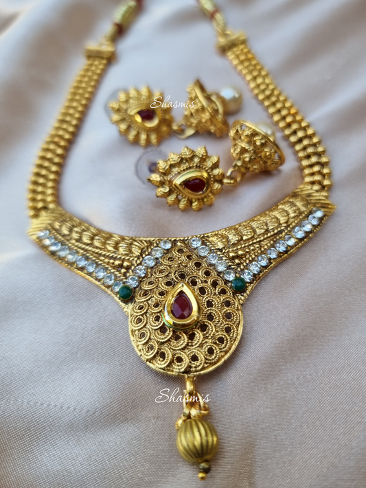 Gold Plated Temple Jewellery Necklace And Earrings With Rhinestone  and Ruby Centre Stone