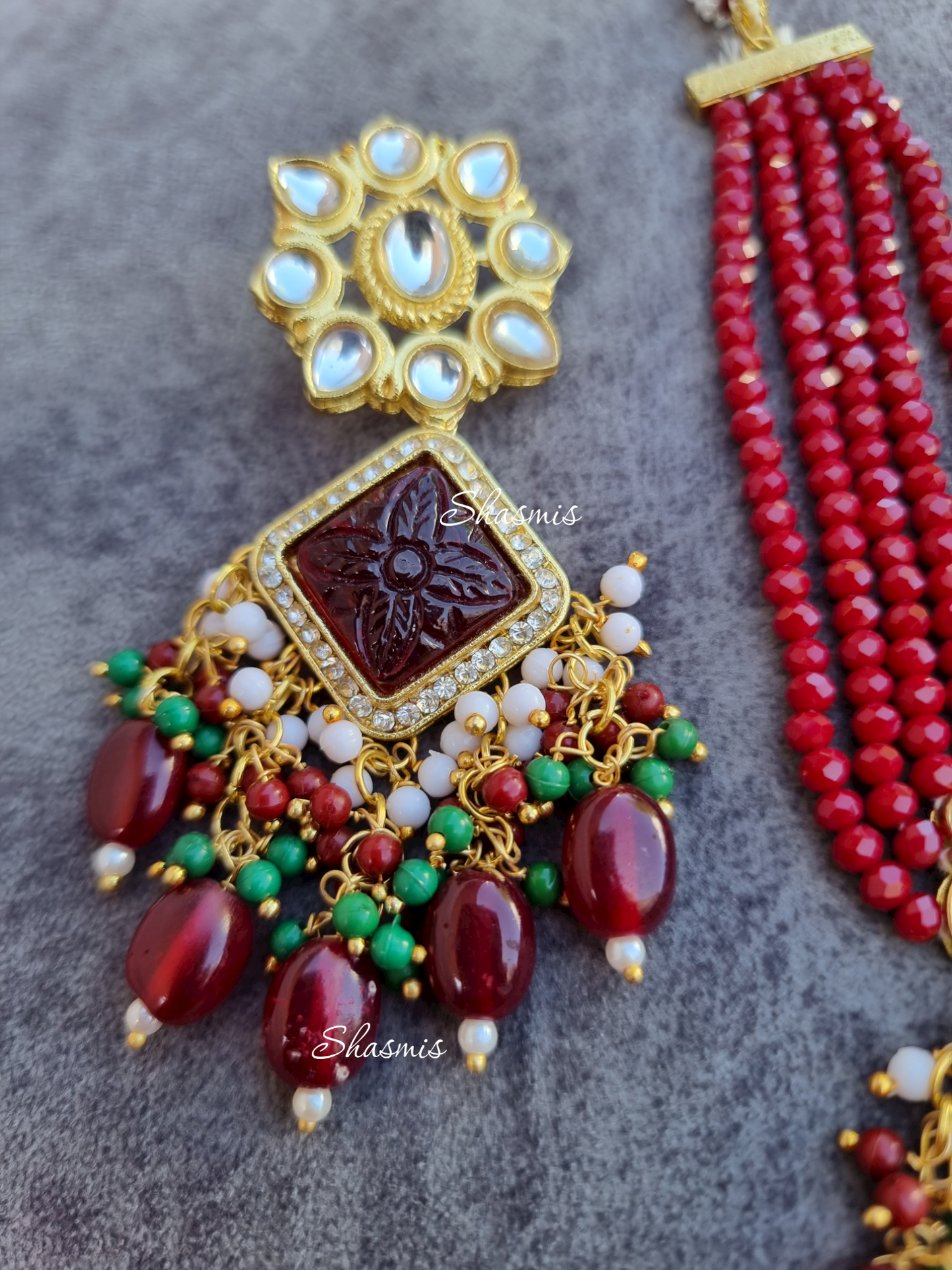 Maroon Color Kundan Necklace With Carved Stone and Earrings