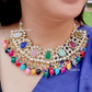 Kundan Stones Necklace And Earrings With Pearl On Drop And Almond shape Carved Stones