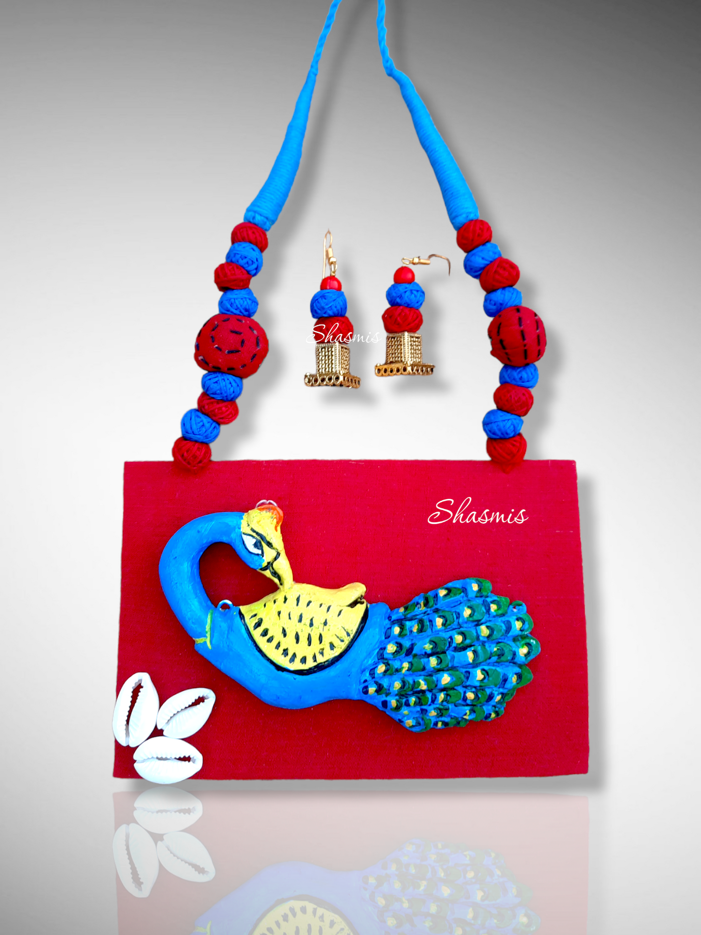 Red Fabric With Peacock Clay Design and Kaudi Work