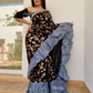Black Color Saree With Golden Design And Grey Color Ruffle