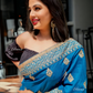 Rama Blue and Beige Color Zari Work Georgette Saree