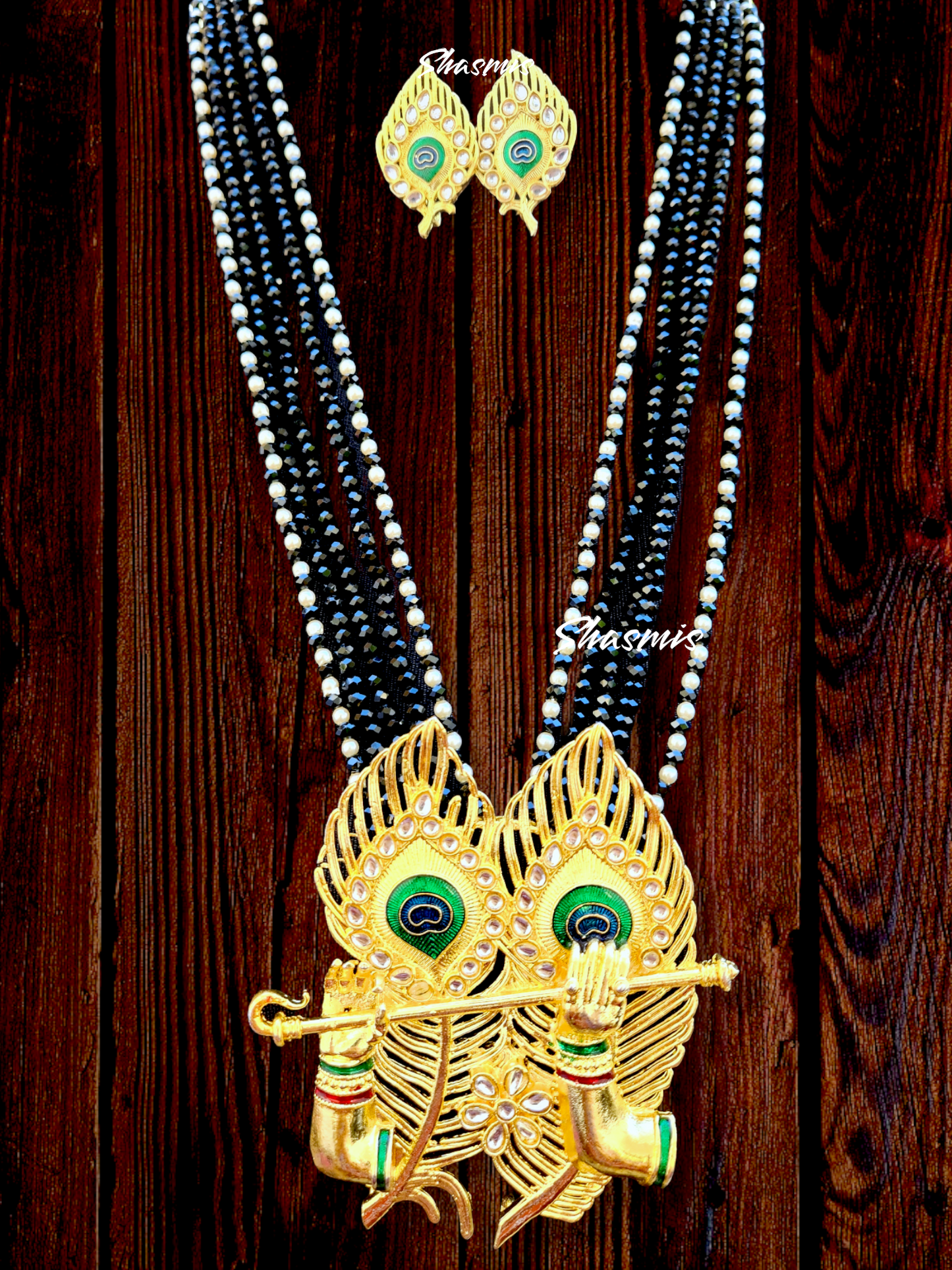 Black Color Beads With Peacock Feather Pendent