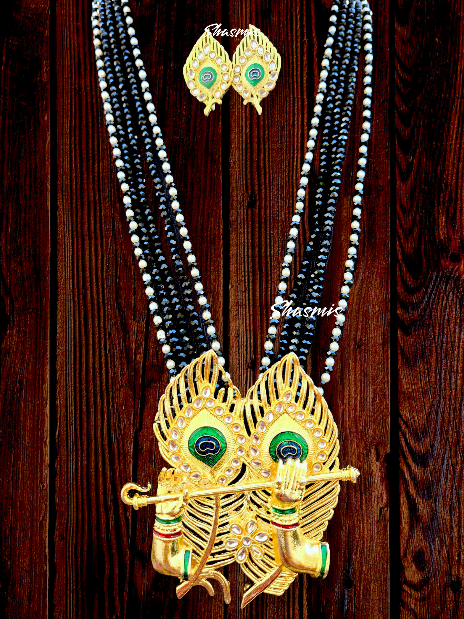 Black Color Beads With Peacock Feather Pendent