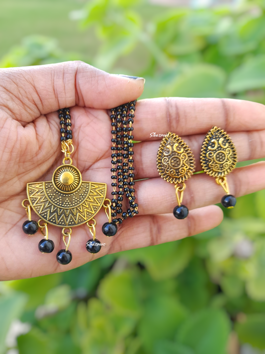 Golden Pendent With Black Beads On Drop Mangalsutra