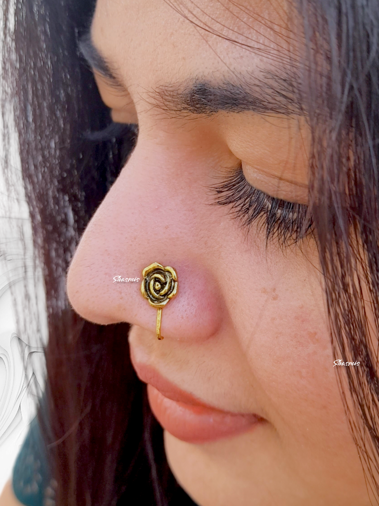 Gold flower deals nose pin