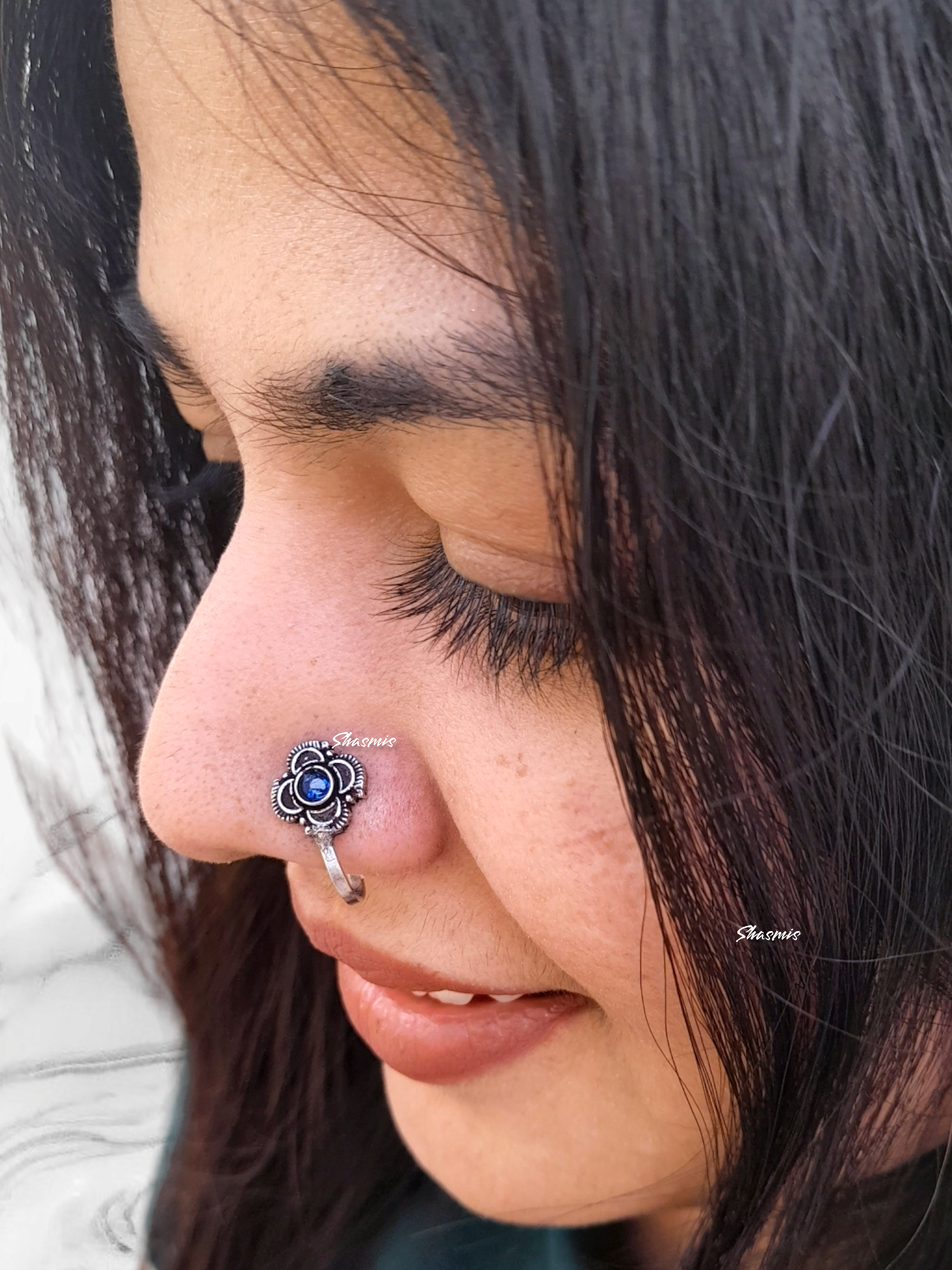 Nose pin on sale blue stone