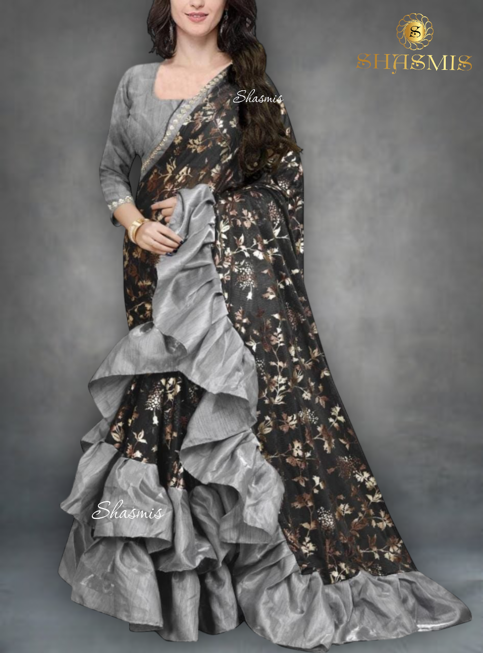 Black Color Saree With Golden Design And Grey Color Ruffle