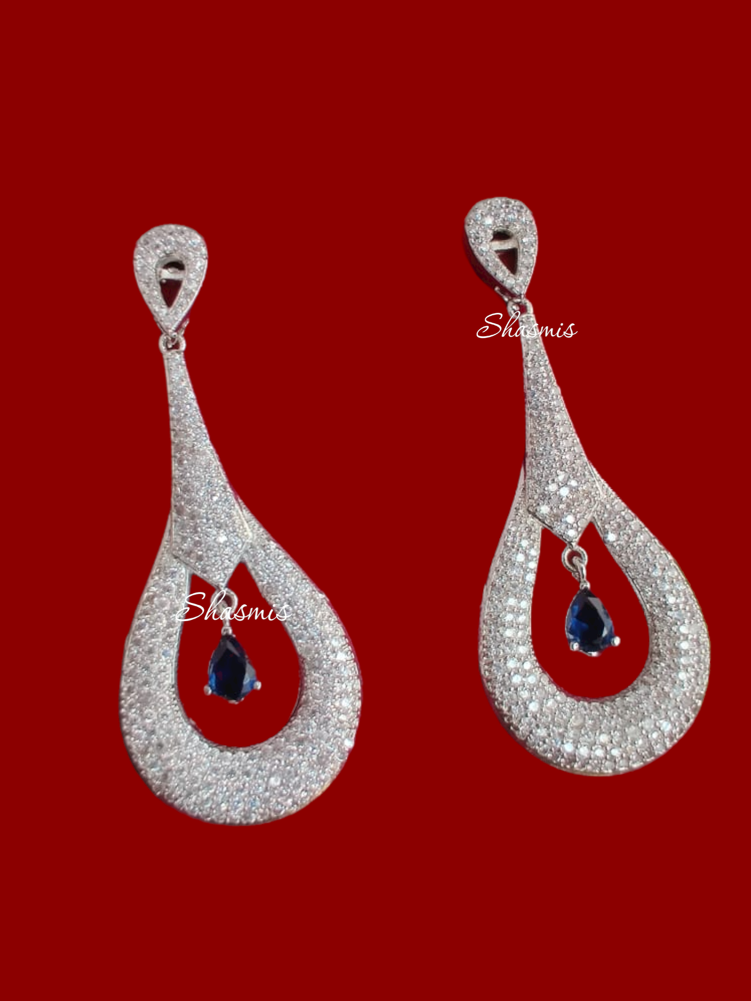 Silver Finish With Blue Stone In the Centre Diamond Earrings